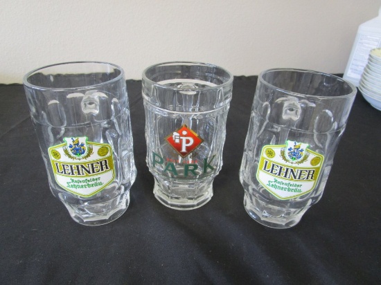 Set of 3 glass German beer steins.