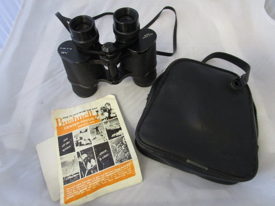 Bushnell Center Focus Binoculars with case.