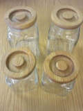 Lot of 4 Glass Canisters with Wood Lids