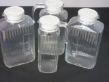 Lot of 4 Glass Drinking Carafes with Plastic Lids