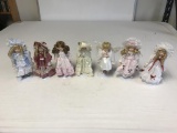 Lot of 6 Porcelain Dolls 8 inches with stands