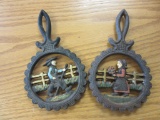 Lot of 2 Hand Painted Cast Iron Trivets