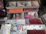 Case of beading supplies and beads