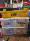 Sorting drawers of glue and tape