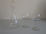 Wine carafe and two wine glasses