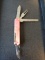 Vintage pink multi-use pocket knife