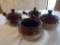 4 stoneware crock-style bowls with 3 lids