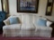 Blue/tan accents living room sofa with pillows