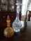 Two glass decanters with stoppers