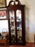 Lighted wood curio cabinet with mirrors