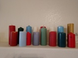 Large lot of tall and colorful candles
