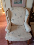 Blue and pink floral upholstered armchair