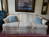 Blue/tan accents living room sofa with pillows