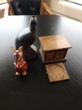 Mixed wood items: mouse, eagle, and coasters