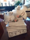 Doves resting on books trinket box