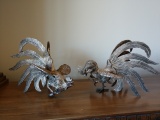 Pair of fighting roosters - heavy carved metal