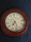 Red painted Colonial Clock Co. wall clock