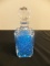 Glass Vase Filled with Decorative Blue Water Beads