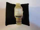 Harvel Gold Toned Watch With Stretch Band