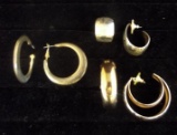 Pierced gold tone loop earrings