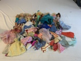 Lot of 9 Vintage Barbie Dolls plus Extra Clothing