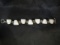 .925 Silver Bracelet w/ 7 White Stone Panels