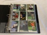 Binder of Golf Trading Cards with TIGER WOODS RC
