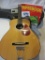 Regal Acoustic Guitar With Case, Book, and Tuner