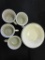 Teacups and Saucers With Dessert Bowls