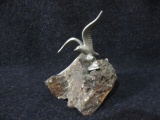 Metal Bird Figurine on Stone Piece