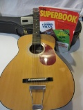 Regal Acoustic Guitar With Case, Book, and Tuner