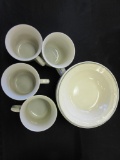 Teacups and Saucers With Dessert Bowls