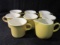 Lot of 7 Yellow Mugs and 1 Creamer Pitcher