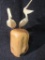 John Perry Pelican Figurines on Wood