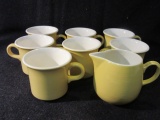 Lot of 7 Yellow Mugs and 1 Creamer Pitcher