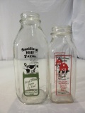 Lot of 2 Milk Bottles
