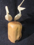 John Perry Pelican Figurines on Wood
