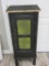 Black Cabinet w/ Shelving, Drawer and Green Design