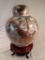 Decorative Oriental porcelain ginger jar on stand