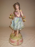 Ceramic girl in woodland statute made in Italy.