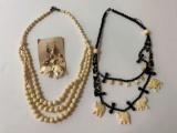 Lot of two vintage costume jewelry necklaces one elephant with matching elephant earrings