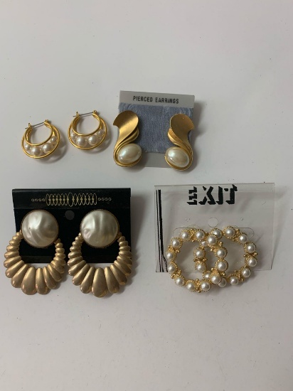 Lot of four vintage costume jewelry gold toned earrings
