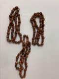 Lot of three vintage costume jewelry carved wood beaded necklaces