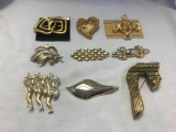 Lot of 9 Gold-Tone Brooches