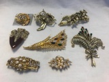 Lot of 9 Gold-Tone and Rhinestone Floral Brooches