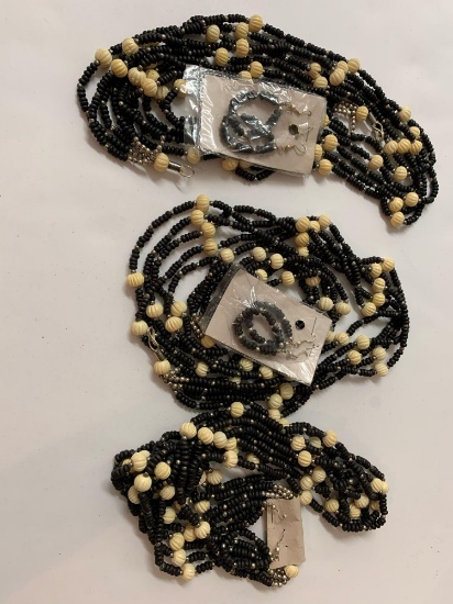 Lot of 3 matching beaded necklace and earring sets.