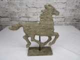 ...Driftwood horse carving on a wood stand