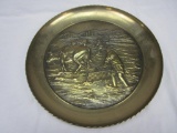 Brass relief farmers with oxen wall hanging