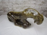 Painted and glazed porcelain cougar figure