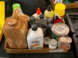 Lot of oil and cleaning supplies